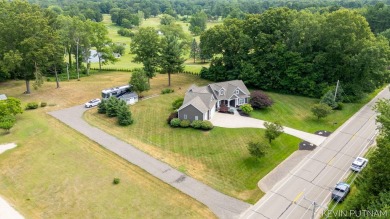 Welcome to your dream retreat just a short distance away from on Clearbrook Golf Club in Michigan - for sale on GolfHomes.com, golf home, golf lot