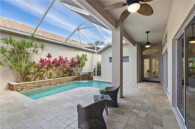 Welcome home to this lovely 3-bedroom, 3.5-bath Courtyard pool on Bonita Bay West in Florida - for sale on GolfHomes.com, golf home, golf lot