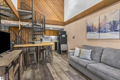 This is a sharp two-bedroom condominium located within 500 feet on Schuss Mountain Golf Club in Michigan - for sale on GolfHomes.com, golf home, golf lot