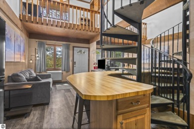 This is a sharp two-bedroom condominium located within 500 feet on Schuss Mountain Golf Club in Michigan - for sale on GolfHomes.com, golf home, golf lot