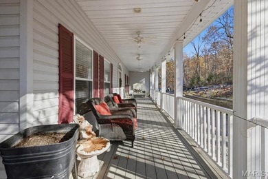 This stunning two-story home offers over 4,000 square feet of on Raintree Country Club in Missouri - for sale on GolfHomes.com, golf home, golf lot