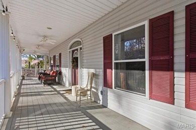 This stunning two-story home offers over 4,000 square feet of on Raintree Country Club in Missouri - for sale on GolfHomes.com, golf home, golf lot