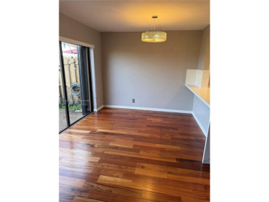 Cozy and updated townhouse located in the beautiful area of on  in Florida - for sale on GolfHomes.com, golf home, golf lot