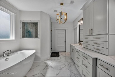 Luxury living awaits in the gated golf community of River on The Club River Forest in Georgia - for sale on GolfHomes.com, golf home, golf lot