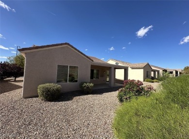 SUPER CLEAN AND LIGHTLY LIVED IN VIRGINIA MODEL.  BEAUTIFUL on Revere Golf Club in Nevada - for sale on GolfHomes.com, golf home, golf lot