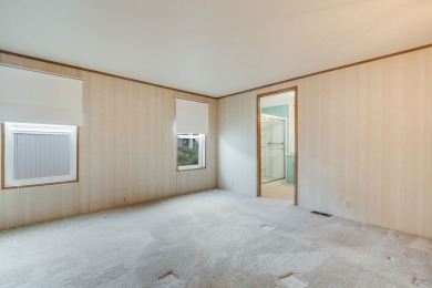 Discover the perfect blend of comfort  convenience in this on Village Greens Golf Club in Montana - for sale on GolfHomes.com, golf home, golf lot
