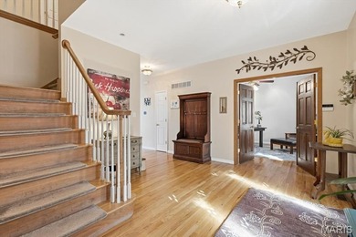 This stunning two-story home offers over 4,000 square feet of on Raintree Country Club in Missouri - for sale on GolfHomes.com, golf home, golf lot