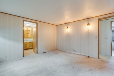 Discover the perfect blend of comfort  convenience in this on Village Greens Golf Club in Montana - for sale on GolfHomes.com, golf home, golf lot