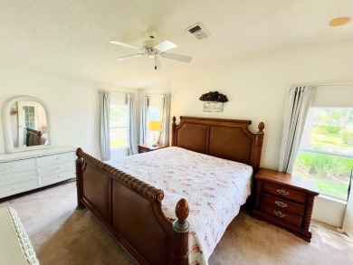 This two-bedroom, two-bathroom home in the gated golf community on Pine Lakes Country Club in Florida - for sale on GolfHomes.com, golf home, golf lot