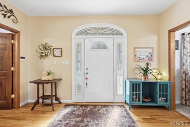 This stunning two-story home offers over 4,000 square feet of on Raintree Country Club in Missouri - for sale on GolfHomes.com, golf home, golf lot