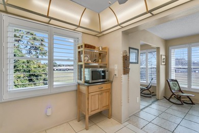 Light, bright, and beautifully maintained TOP-FLOOR CORNER on On Top Of The World Golf Course in Florida - for sale on GolfHomes.com, golf home, golf lot