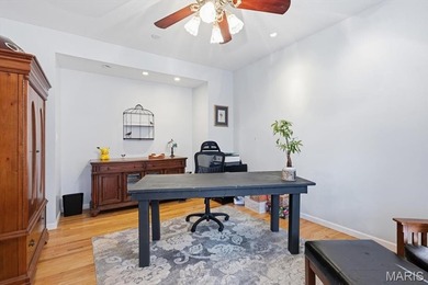 This stunning two-story home offers over 4,000 square feet of on Raintree Country Club in Missouri - for sale on GolfHomes.com, golf home, golf lot