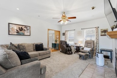 This stunning two-story home offers over 4,000 square feet of on Raintree Country Club in Missouri - for sale on GolfHomes.com, golf home, golf lot