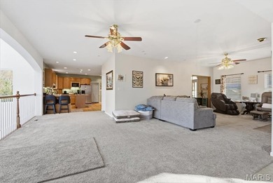 This stunning two-story home offers over 4,000 square feet of on Raintree Country Club in Missouri - for sale on GolfHomes.com, golf home, golf lot