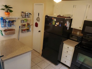 **Charming 2-Bed, 2-Bath Condo in Villas De Golf - Golf Course on Largo Golf Course in Florida - for sale on GolfHomes.com, golf home, golf lot