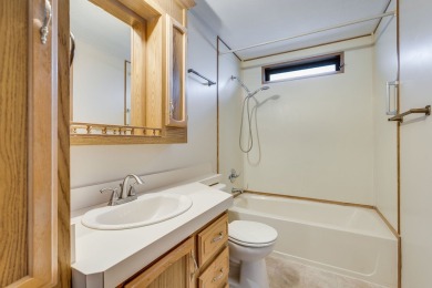 Discover the perfect blend of comfort  convenience in this on Village Greens Golf Club in Montana - for sale on GolfHomes.com, golf home, golf lot