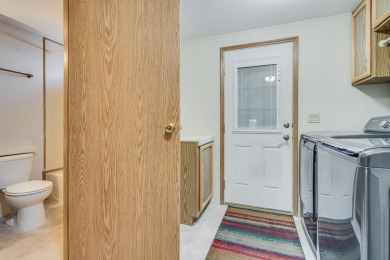 Discover the perfect blend of comfort  convenience in this on Village Greens Golf Club in Montana - for sale on GolfHomes.com, golf home, golf lot