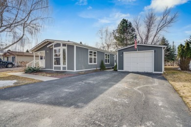 Discover the perfect blend of comfort  convenience in this on Village Greens Golf Club in Montana - for sale on GolfHomes.com, golf home, golf lot