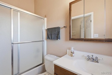 This stunning two-story home offers over 4,000 square feet of on Raintree Country Club in Missouri - for sale on GolfHomes.com, golf home, golf lot