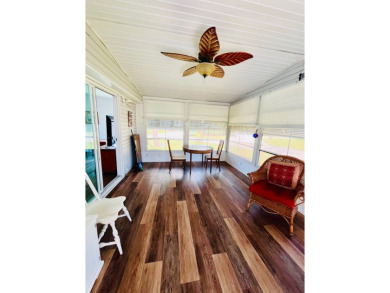 This two-bedroom, two-bathroom home in the gated golf community on Pine Lakes Country Club in Florida - for sale on GolfHomes.com, golf home, golf lot
