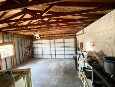 This two-bedroom, two-bathroom home in the gated golf community on Pine Lakes Country Club in Florida - for sale on GolfHomes.com, golf home, golf lot