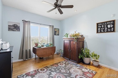 This stunning two-story home offers over 4,000 square feet of on Raintree Country Club in Missouri - for sale on GolfHomes.com, golf home, golf lot