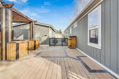 Discover the perfect blend of comfort  convenience in this on Village Greens Golf Club in Montana - for sale on GolfHomes.com, golf home, golf lot