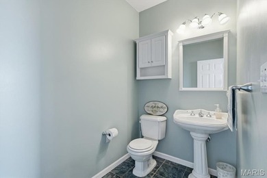 This stunning two-story home offers over 4,000 square feet of on Raintree Country Club in Missouri - for sale on GolfHomes.com, golf home, golf lot