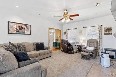 This stunning two-story home offers over 4,000 square feet of on Raintree Country Club in Missouri - for sale on GolfHomes.com, golf home, golf lot