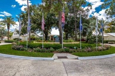 This two-bedroom, two-bathroom home in the gated golf community on Pine Lakes Country Club in Florida - for sale on GolfHomes.com, golf home, golf lot