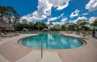 This two-bedroom, two-bathroom home in the gated golf community on Pine Lakes Country Club in Florida - for sale on GolfHomes.com, golf home, golf lot