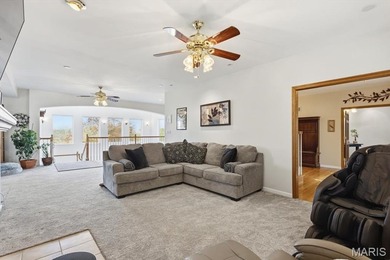 This stunning two-story home offers over 4,000 square feet of on Raintree Country Club in Missouri - for sale on GolfHomes.com, golf home, golf lot