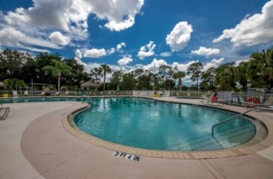 This two-bedroom, two-bathroom home in the gated golf community on Pine Lakes Country Club in Florida - for sale on GolfHomes.com, golf home, golf lot