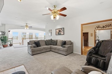 This stunning two-story home offers over 4,000 square feet of on Raintree Country Club in Missouri - for sale on GolfHomes.com, golf home, golf lot