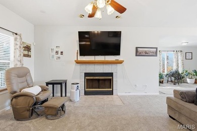 This stunning two-story home offers over 4,000 square feet of on Raintree Country Club in Missouri - for sale on GolfHomes.com, golf home, golf lot