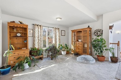 This stunning two-story home offers over 4,000 square feet of on Raintree Country Club in Missouri - for sale on GolfHomes.com, golf home, golf lot