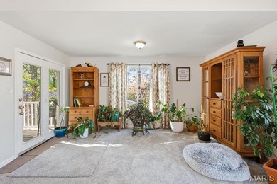 This stunning two-story home offers over 4,000 square feet of on Raintree Country Club in Missouri - for sale on GolfHomes.com, golf home, golf lot