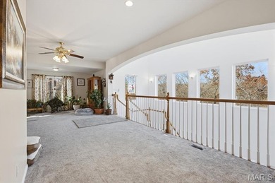 This stunning two-story home offers over 4,000 square feet of on Raintree Country Club in Missouri - for sale on GolfHomes.com, golf home, golf lot