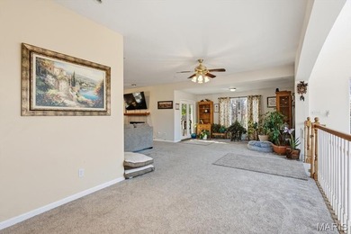 This stunning two-story home offers over 4,000 square feet of on Raintree Country Club in Missouri - for sale on GolfHomes.com, golf home, golf lot