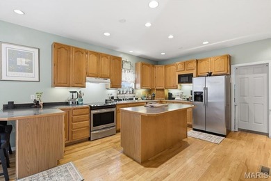 This stunning two-story home offers over 4,000 square feet of on Raintree Country Club in Missouri - for sale on GolfHomes.com, golf home, golf lot