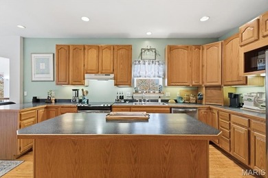 This stunning two-story home offers over 4,000 square feet of on Raintree Country Club in Missouri - for sale on GolfHomes.com, golf home, golf lot