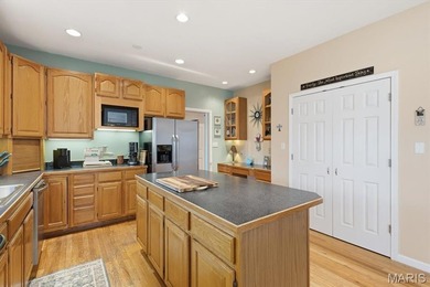 This stunning two-story home offers over 4,000 square feet of on Raintree Country Club in Missouri - for sale on GolfHomes.com, golf home, golf lot