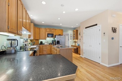 This stunning two-story home offers over 4,000 square feet of on Raintree Country Club in Missouri - for sale on GolfHomes.com, golf home, golf lot