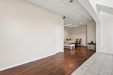 This stunning two-story home offers over 4,000 square feet of on Raintree Country Club in Missouri - for sale on GolfHomes.com, golf home, golf lot