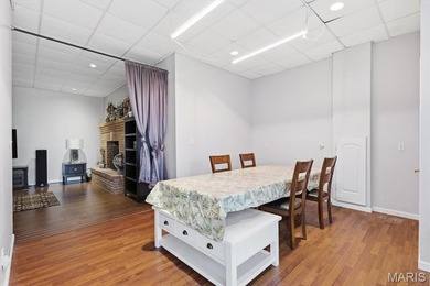 This stunning two-story home offers over 4,000 square feet of on Raintree Country Club in Missouri - for sale on GolfHomes.com, golf home, golf lot