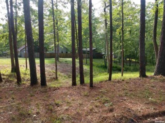 Beautiful lot nestled in the trees (2 building sites) located in on Diamondhead Golf & Country Club in Arkansas - for sale on GolfHomes.com, golf home, golf lot