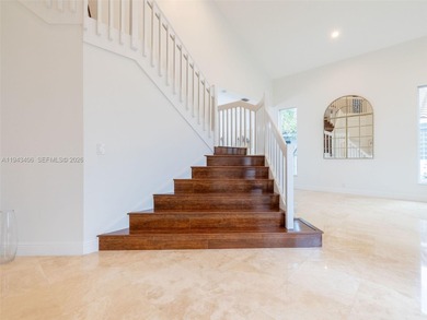 Experience luxury living in Weston Hills, a premier gated golf on Weston Hills Country Club in Florida - for sale on GolfHomes.com, golf home, golf lot