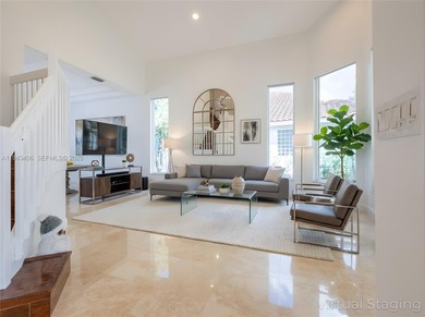 Experience luxury living in Weston Hills, a premier gated golf on Weston Hills Country Club in Florida - for sale on GolfHomes.com, golf home, golf lot