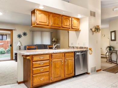 Discover your dream home in a serene cul-de-sac in Pueblo West on Desert Hawk At Pueblo West in Colorado - for sale on GolfHomes.com, golf home, golf lot