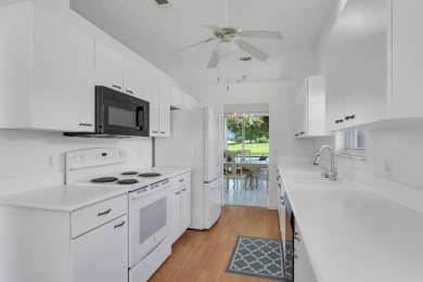 Invest in Location with this Lakefront property overlooking the on Meadowood Golf and Tennis Club in Florida - for sale on GolfHomes.com, golf home, golf lot